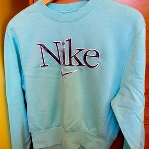 Nike women’s crew neck sweatshirt, light blue. Size small.